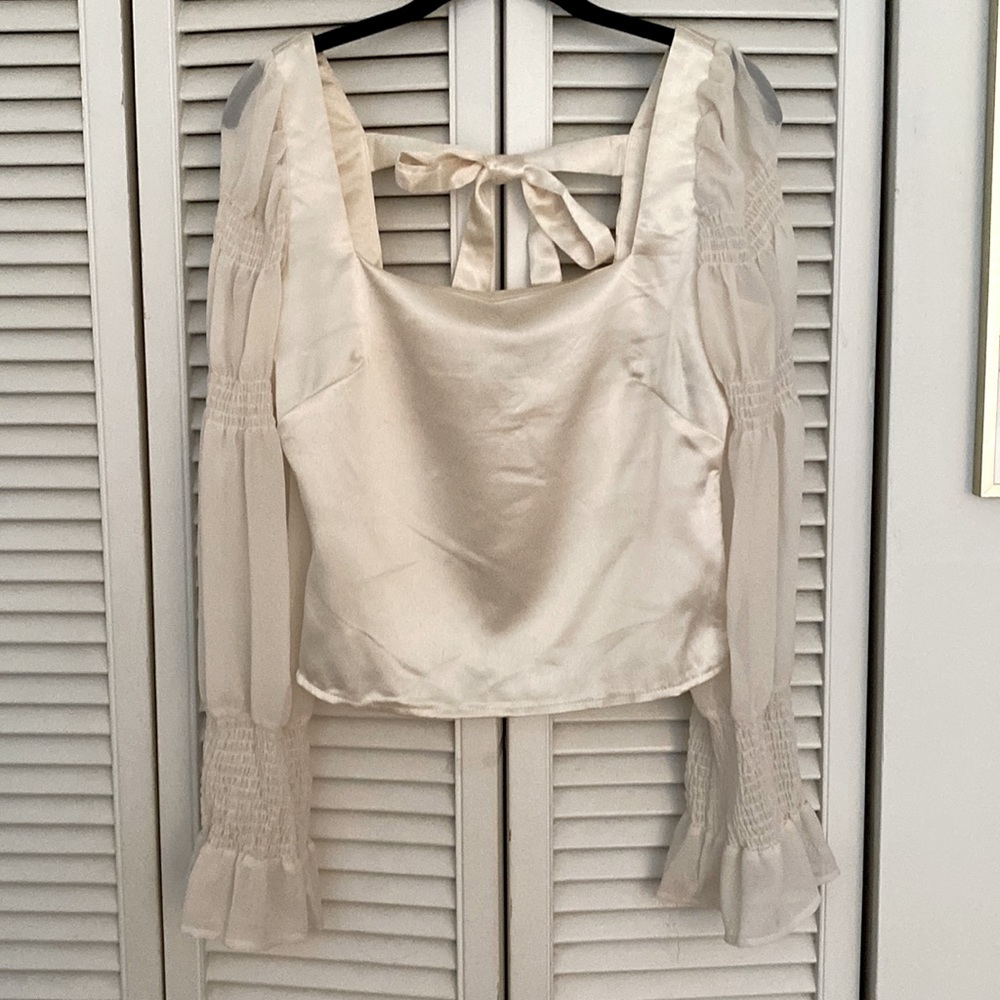Lulu’s cream satin top with sheer sleeves